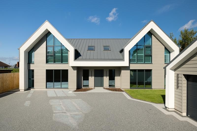Front elevation of modern home with metal roof